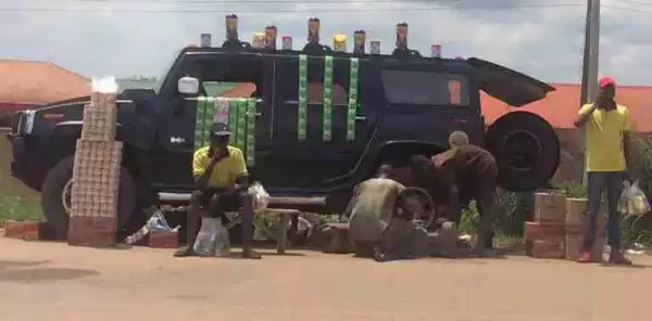 Photos Of Hummer Jeep Being Used To Sell Beverages And Provisions In Edo